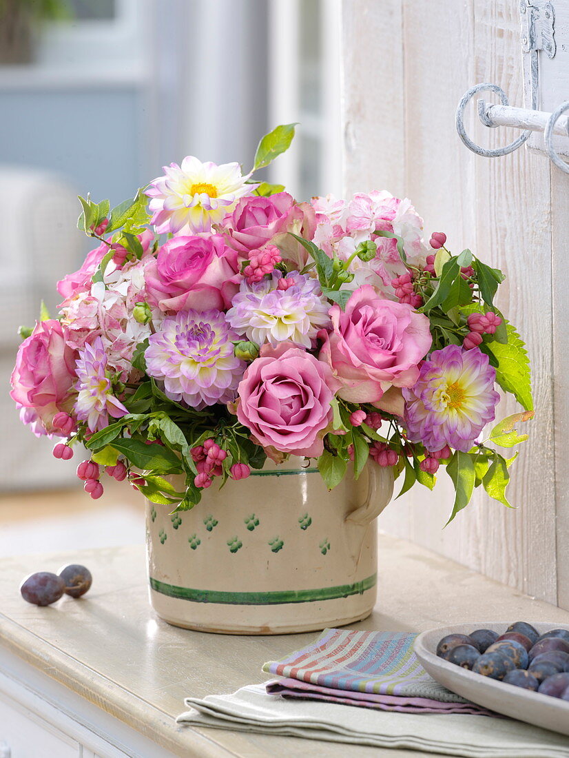 Bouquet with Rosa 'Variance' (roses), Dahlia (dahlias)