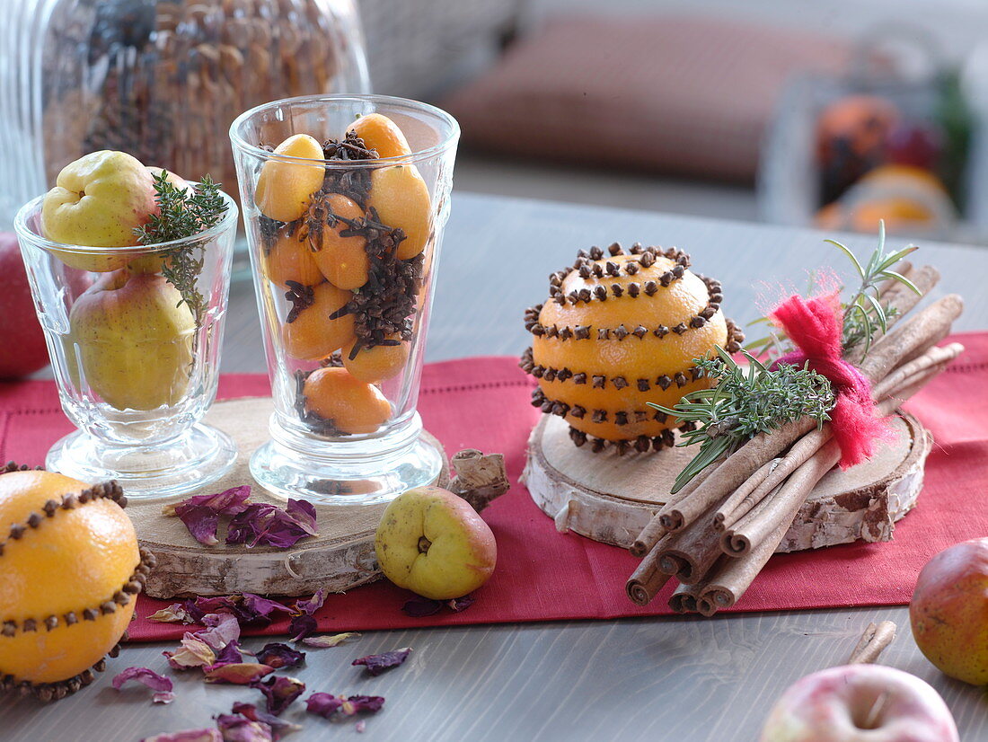 Christmas scent arrangement of orange spiked with cloves, kumquat