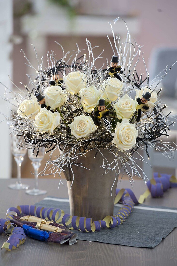 New Year's Eve bouquet with Rosa 'Dolomiti' (white roses), fairy lights