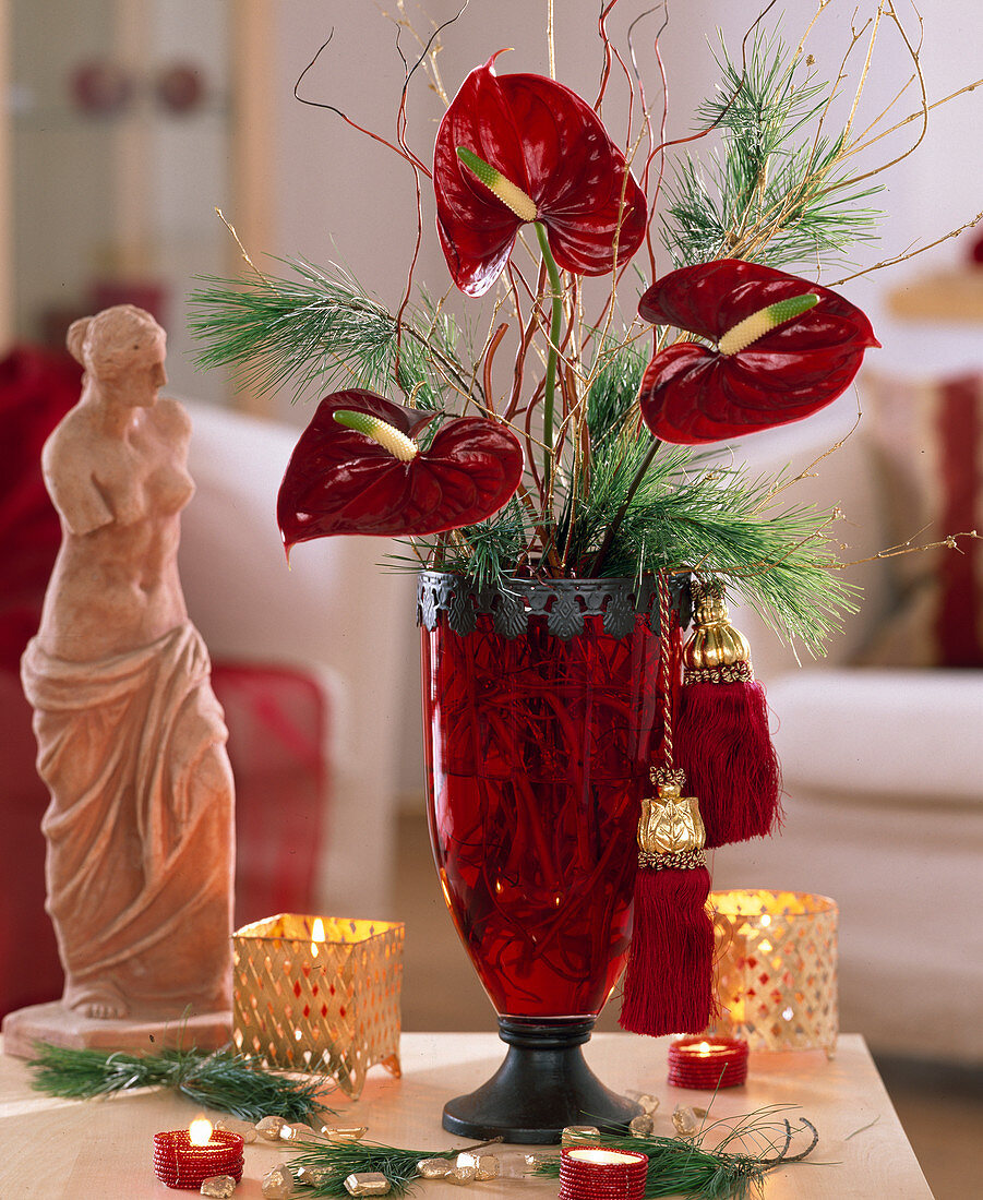 Bouquet of Anthurium flamingo, silk pine and Ilex holly branches