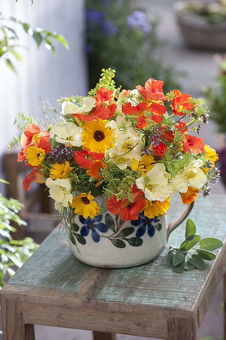 Bouquet of edible flowers and herbs