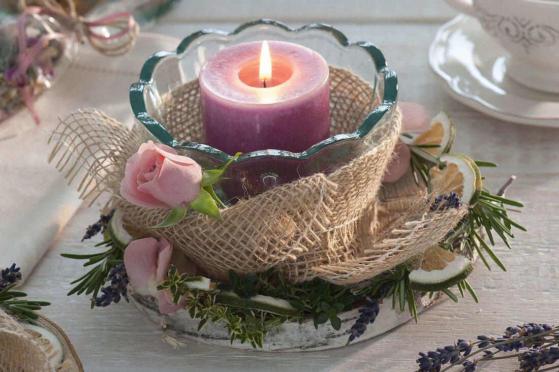 Naturally decorated lantern with jute ribbon, wreath of rosemary