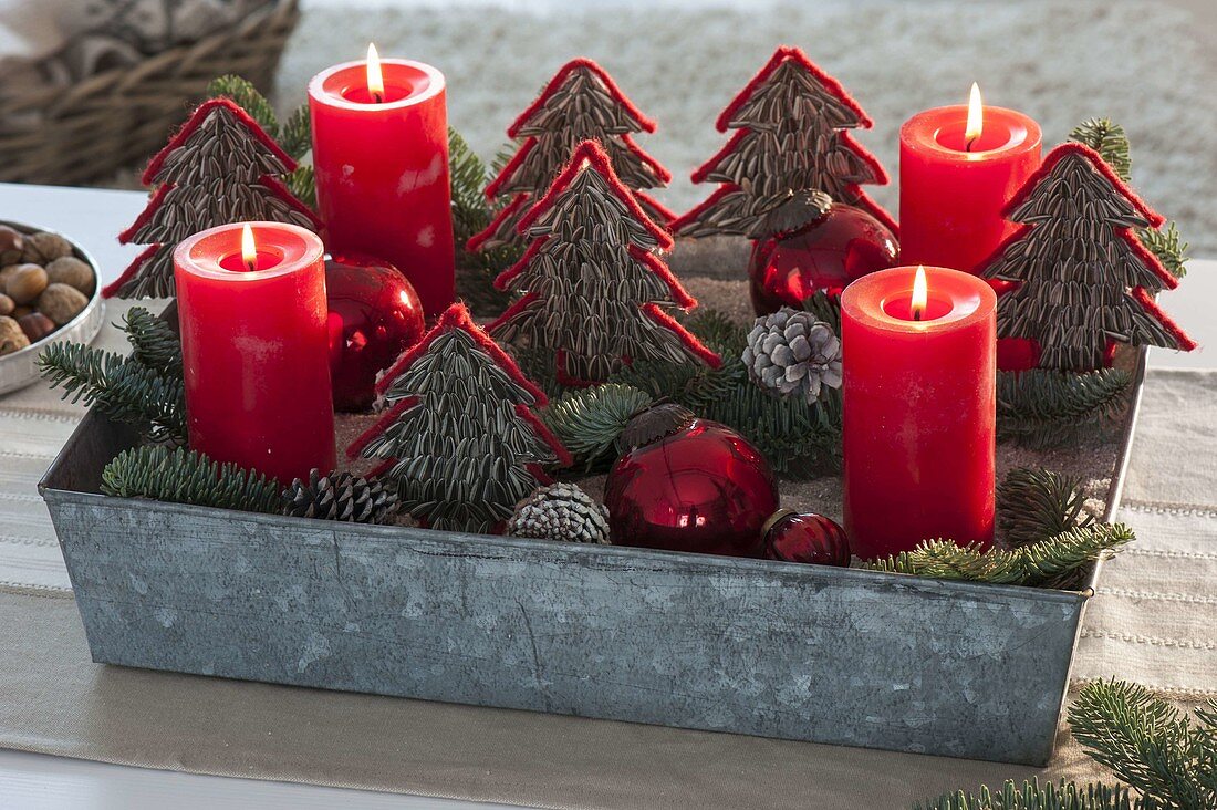 Advent wreath with homemade trees from sunflower seeds