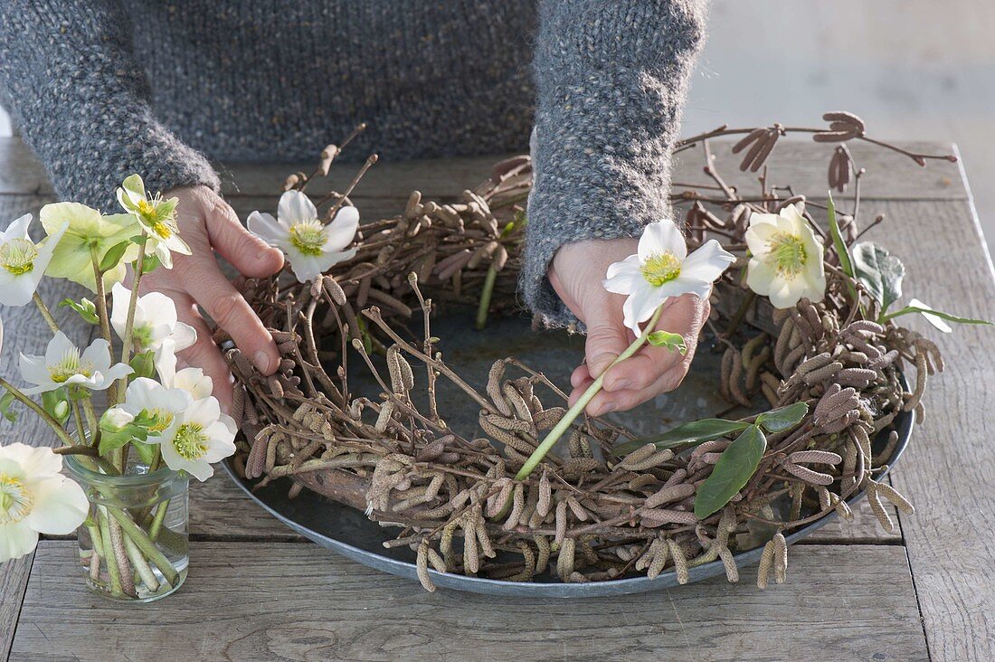 Wreath of hazel branches and Christmas roses