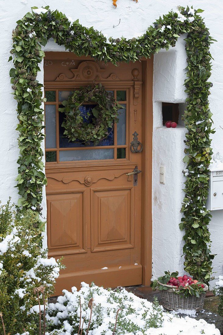 Tying an ivy garland