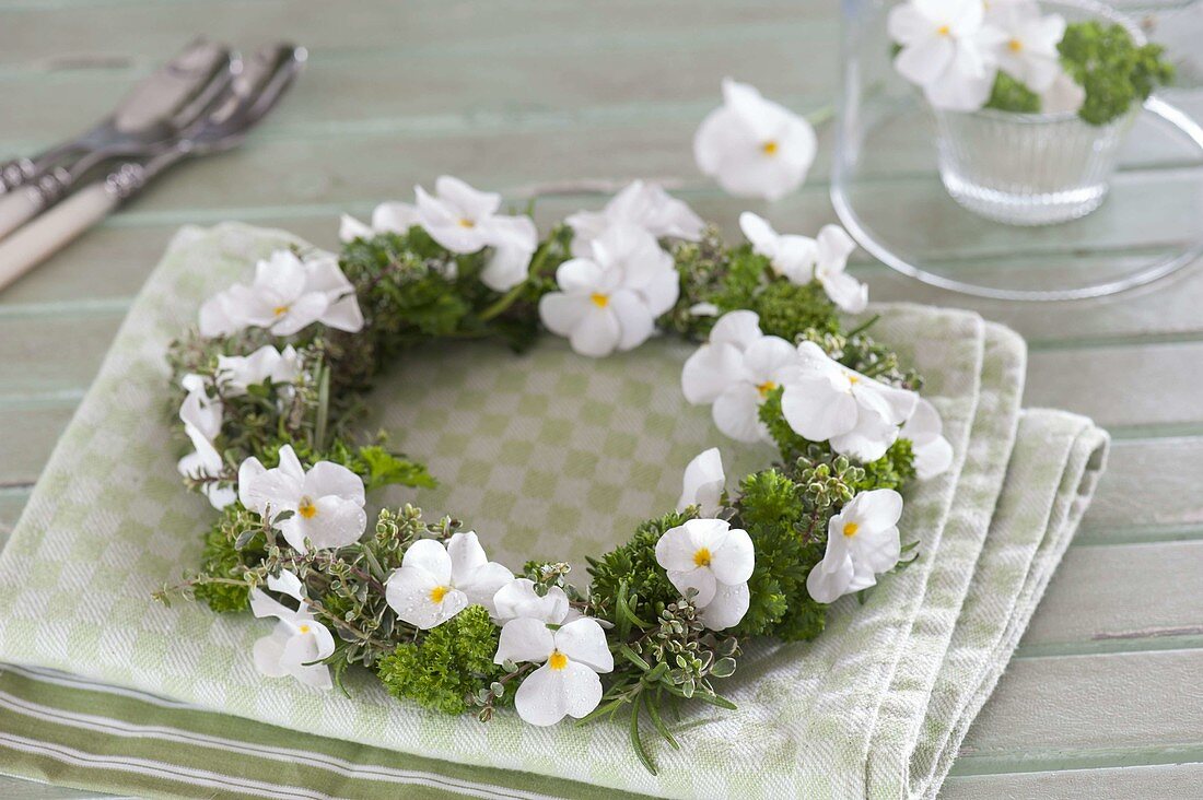 Small mixed wreath of viola cornuta (horned violet), parsley