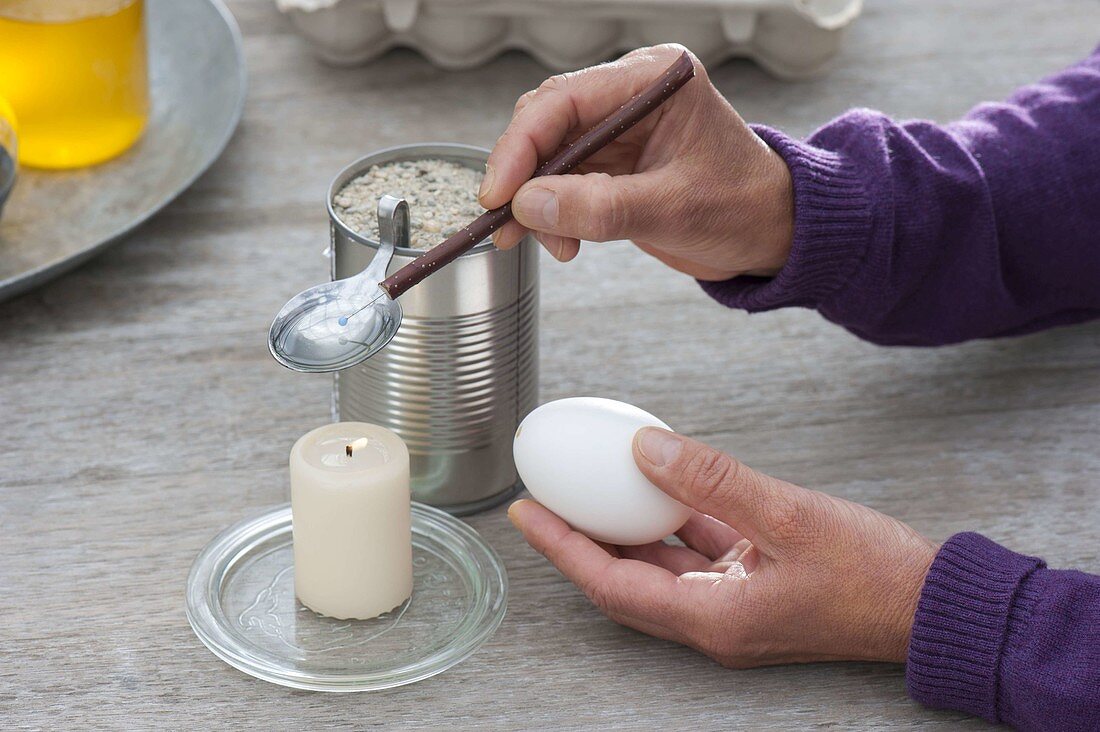 Dyeing eggs with wax reservation technique