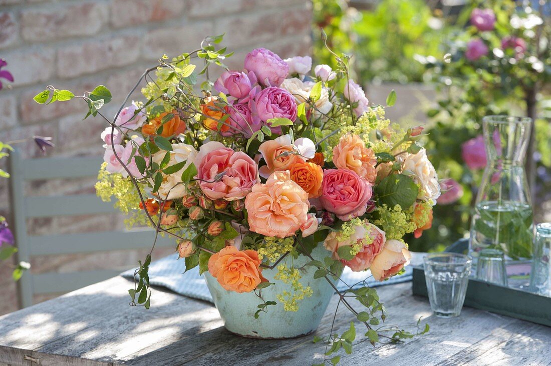 Bouquet of roses, tendrils of clematis and alchemilla