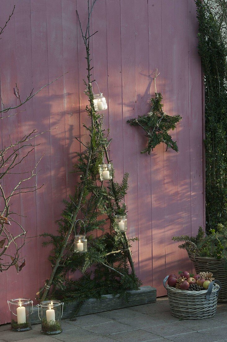 Stylized Christmas tree made of apple branches