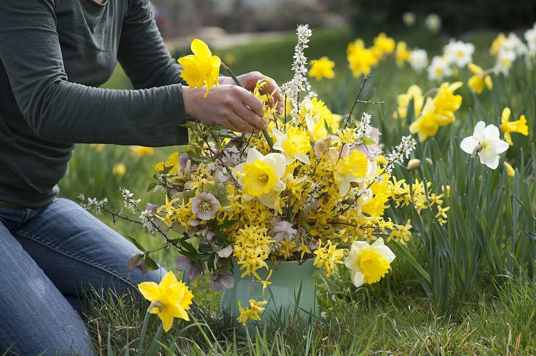 Yellow spring bouquet with daffodil and gold bells