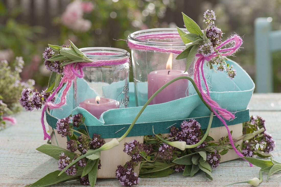 Deterrent canning jars as lanterns in woodchip box