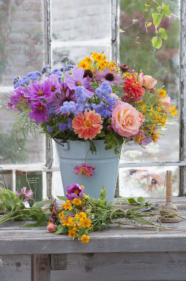 Fresh cut flowers for bouquet placed in bucket