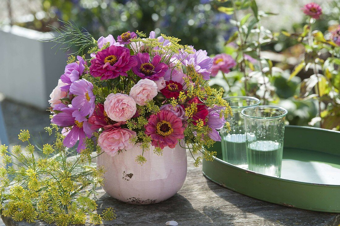 Fragrant bouquet of roses, zinnia and fennel flowers