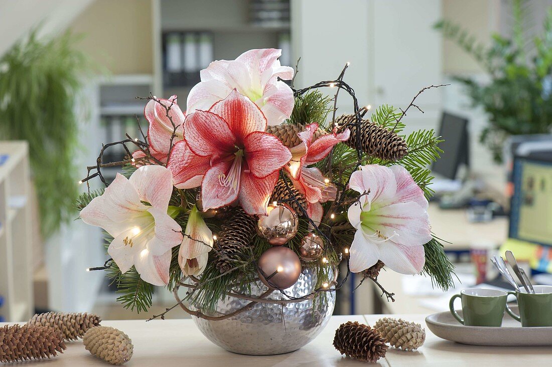 Christmas bouquet with fairy lights in the office