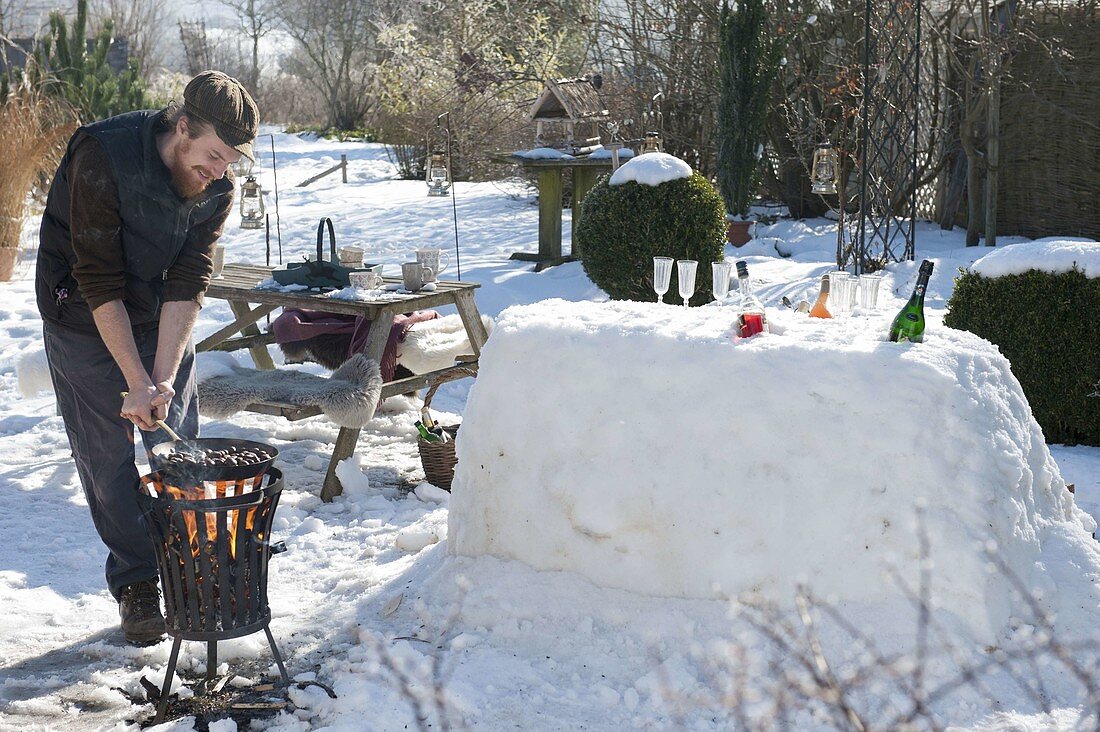 Snow bar in the winter snowy garden