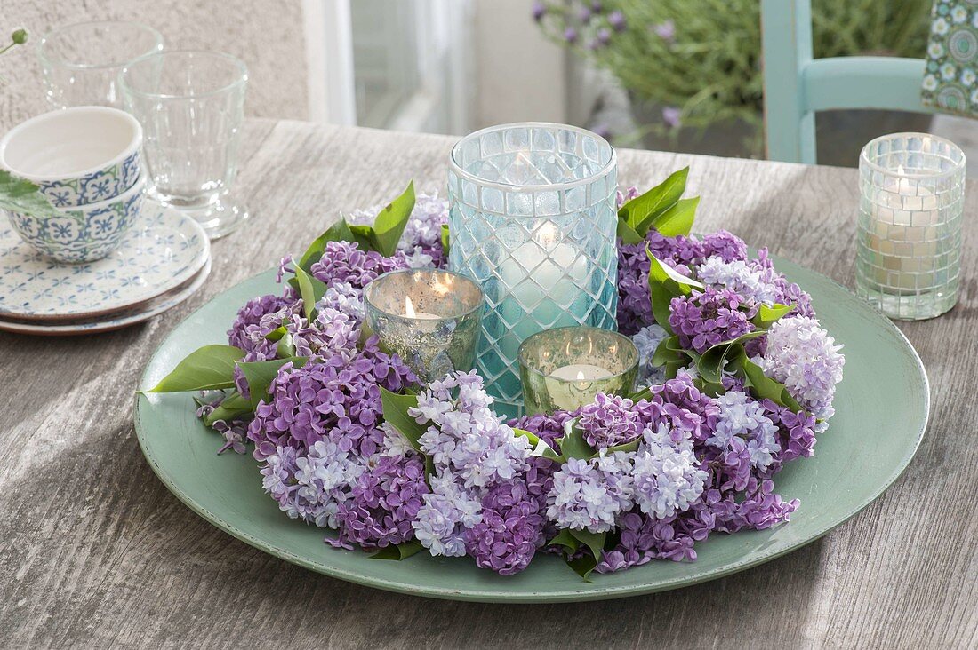 Plate Wreath Of Lilac Flowers With Lantern