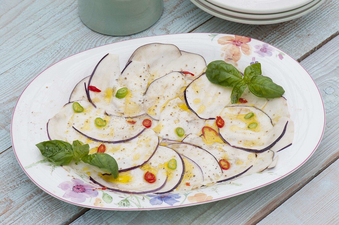 Carpaccio of aubergines with basil and chilli peppers