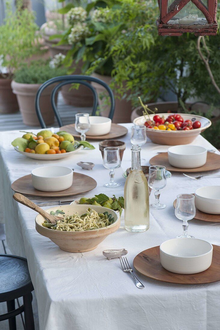 Table with salad and fruits