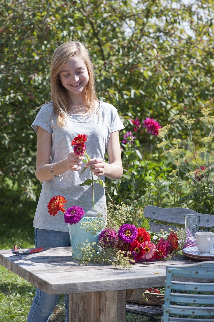 Putting cottage garden flowers bouquet