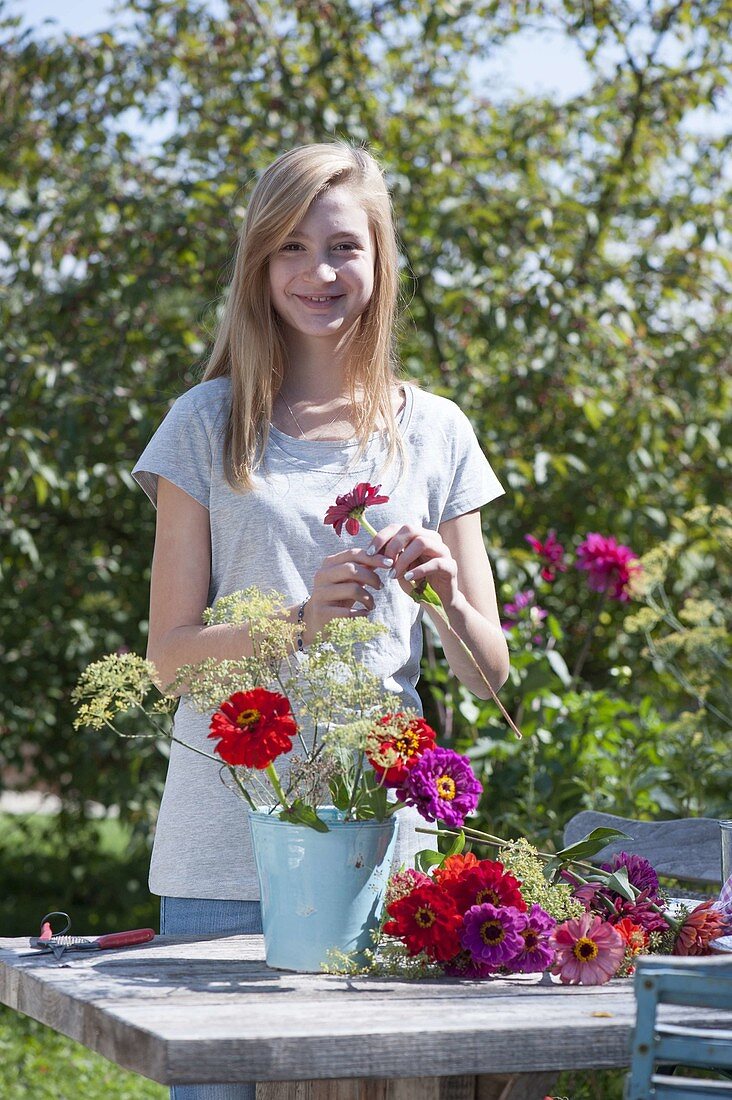 Putting cottage garden flowers bouquet