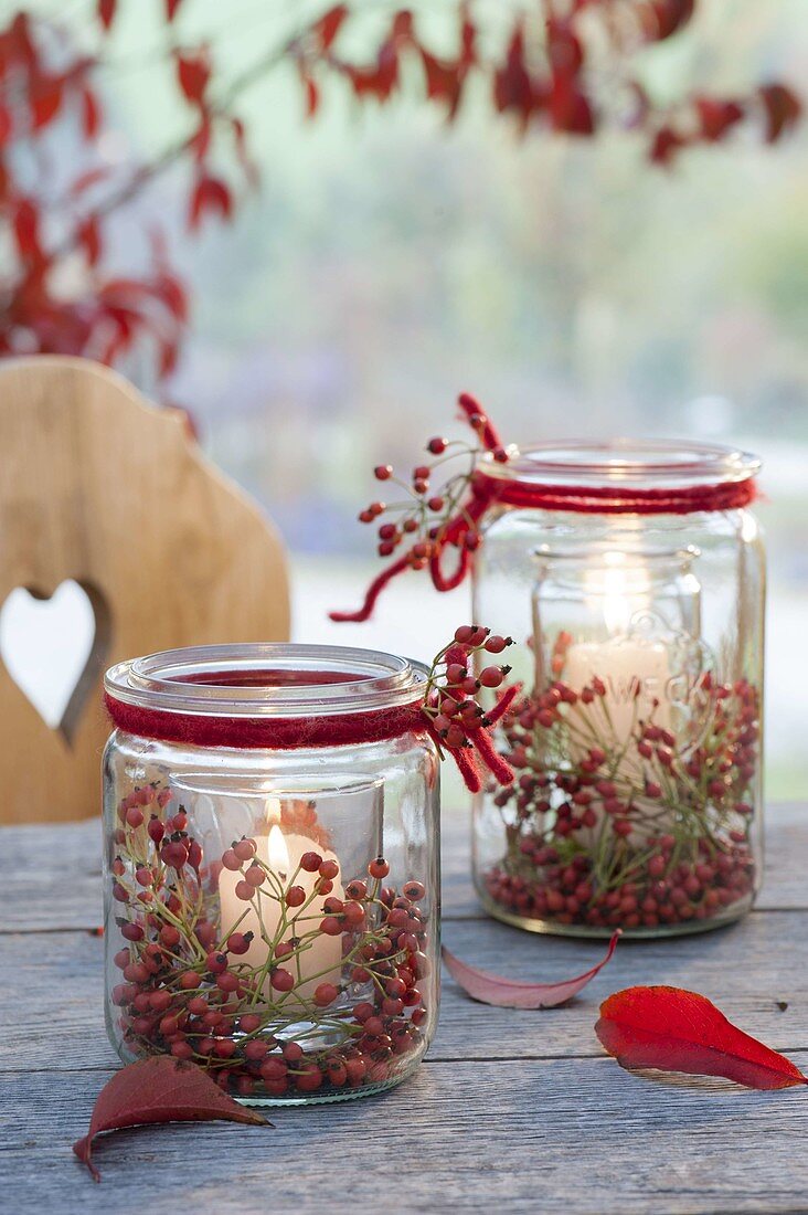 Preserving jars as glass in glass. Wind lights with pink