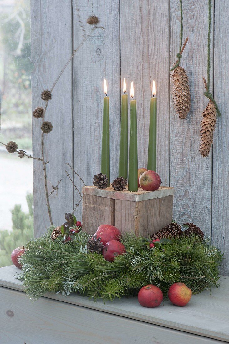 Unusual Advent wreath with wooden block as a candle holder