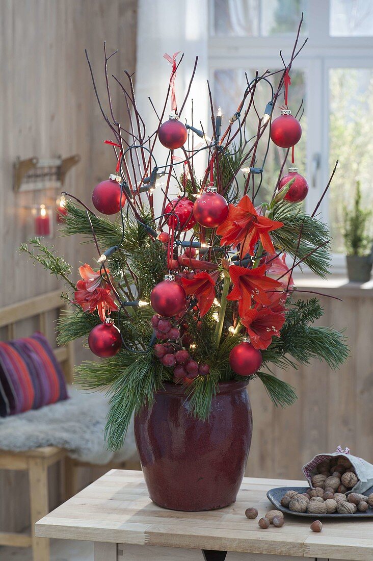 Green-red bouquet made of Cornus (dogwood) and Pinus branches