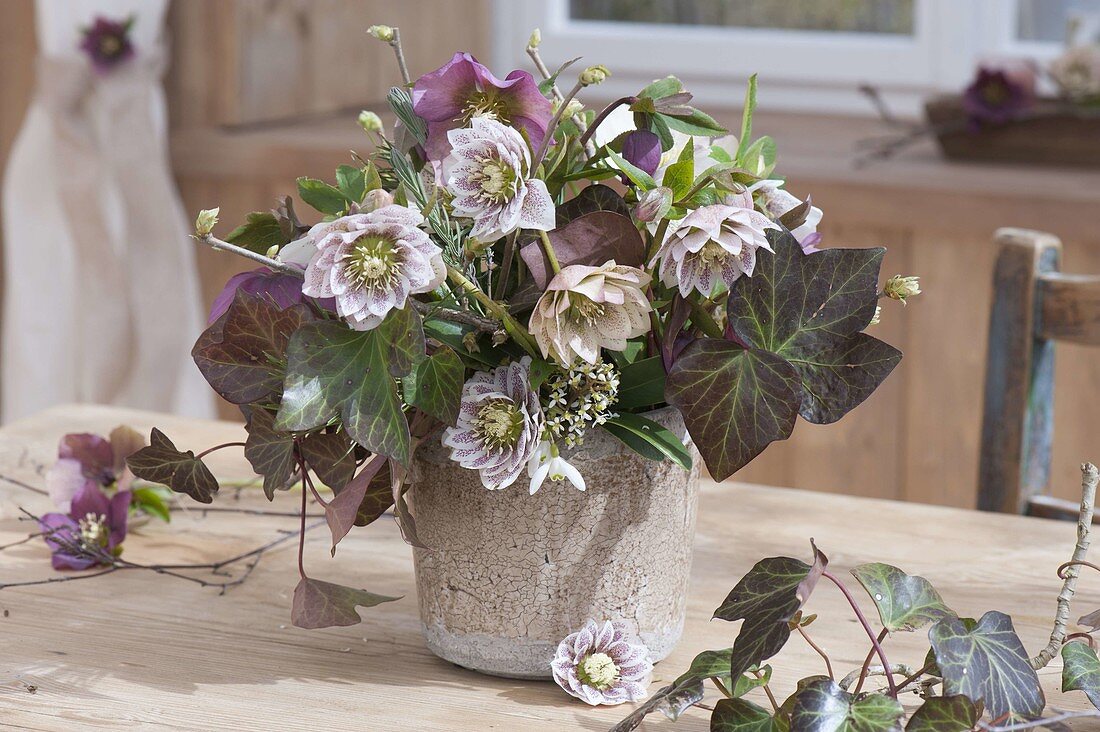 Rustic bouquet with Helleborus orientalis (lenten hellebore)