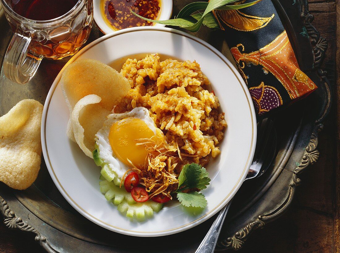 Fried Rice with a Fried Egg; Cucumber Slices