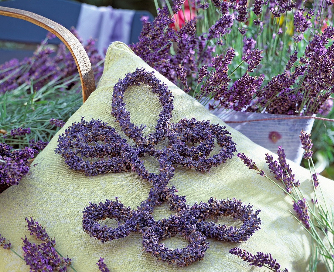 Lavender flower ornament lying on cushion