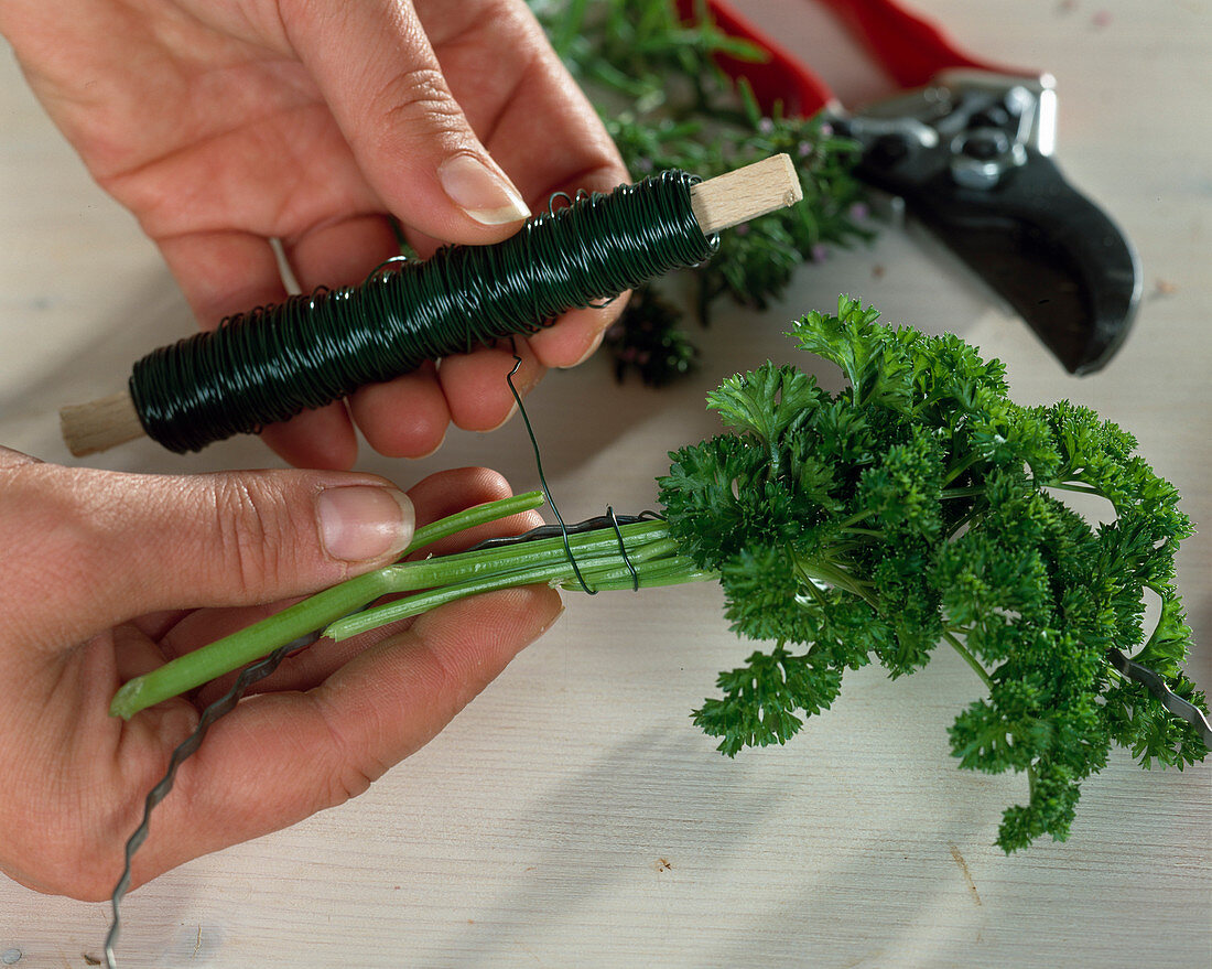 Tying a herb wreath