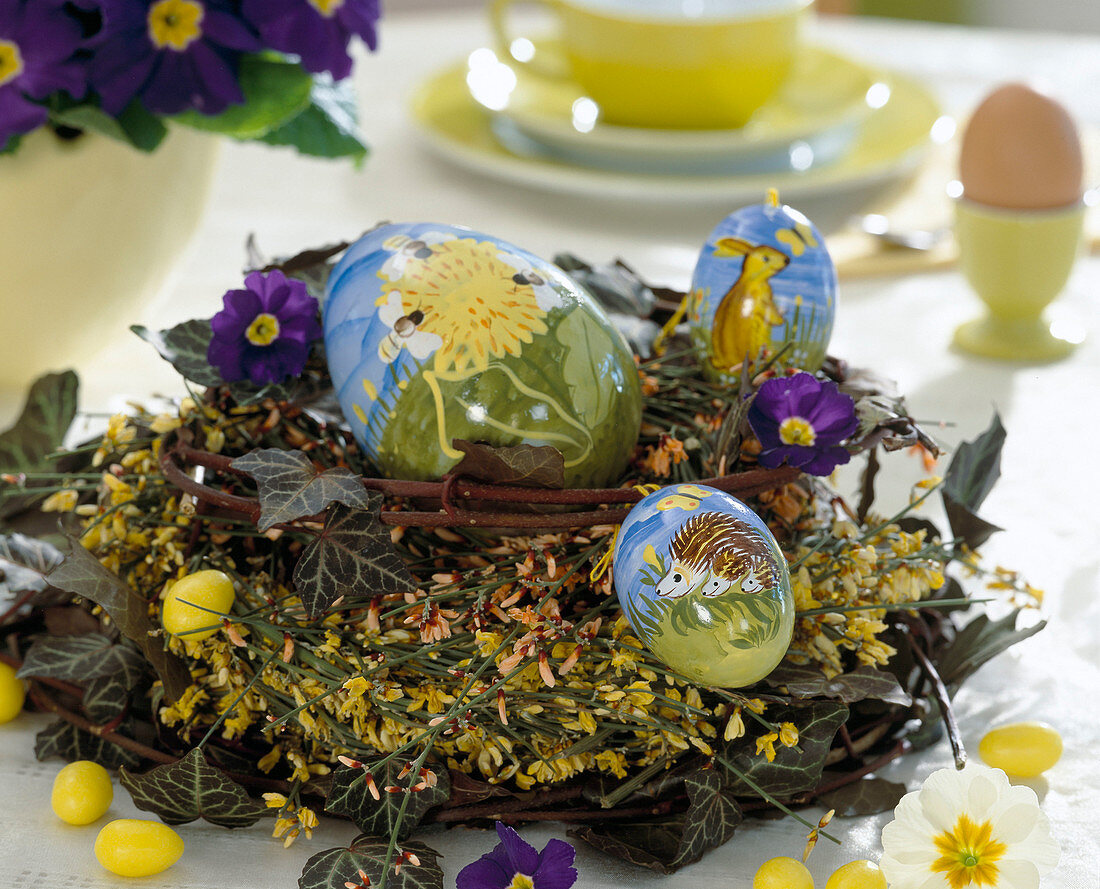 Painted Easter eggs on a gorse wreath