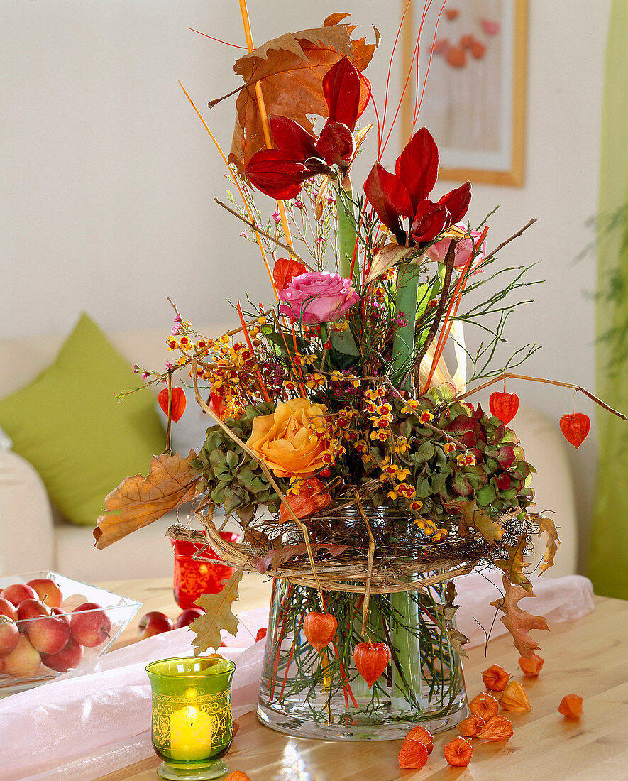 Autumn bouquet with tree shrike, amaryllis and roses