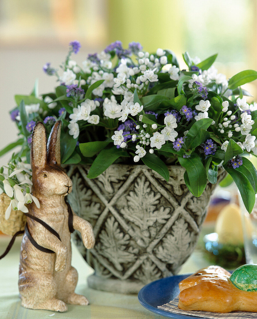 Bouquet of allium (ornamental leek), myosotis (forget-me-not), rabbit