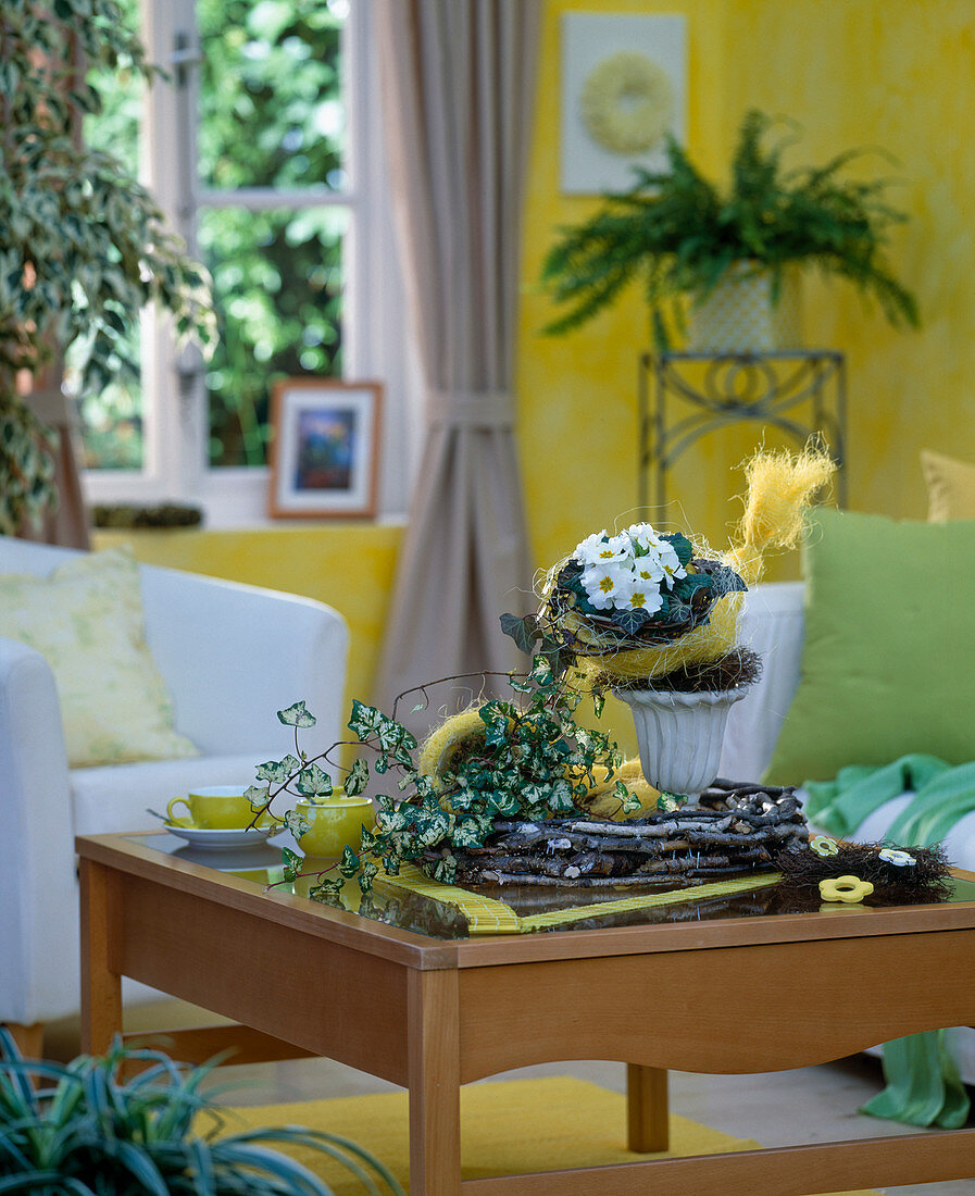 Living room with Primula acaulis (cushion primrose), sisal bag