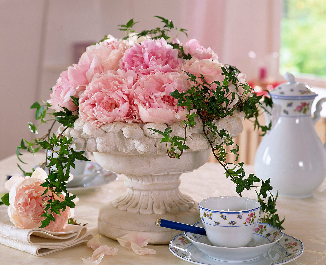 Plaster bowl (impregnated) as a vase for peonies