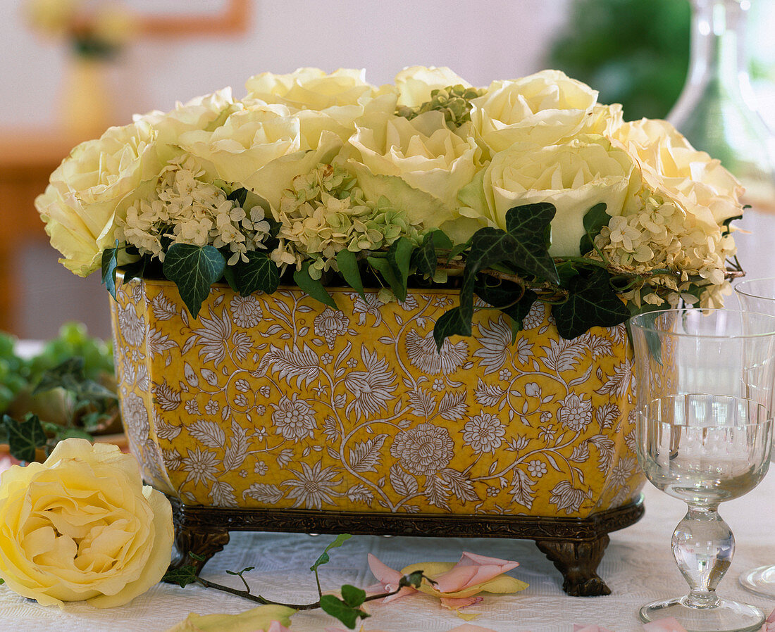 White rose petals in a bowl, gaps filled in