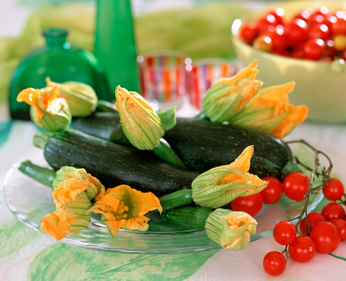 Courgettes and courgette flowers, tomato vine