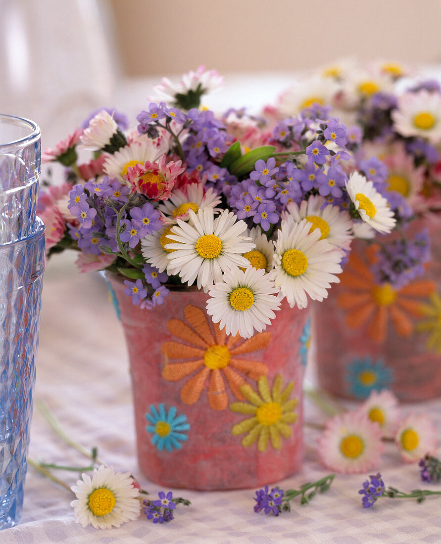 Mini-bouquet with bellis (daisies) and myosotis