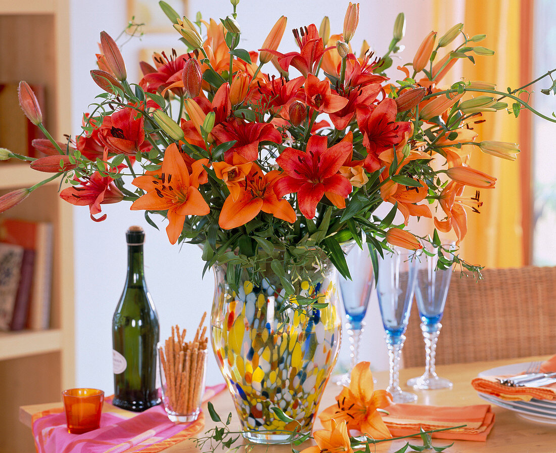 Lilium asiaticum 'Tresor' (red and orange), 'Solfarino' (red and orange)