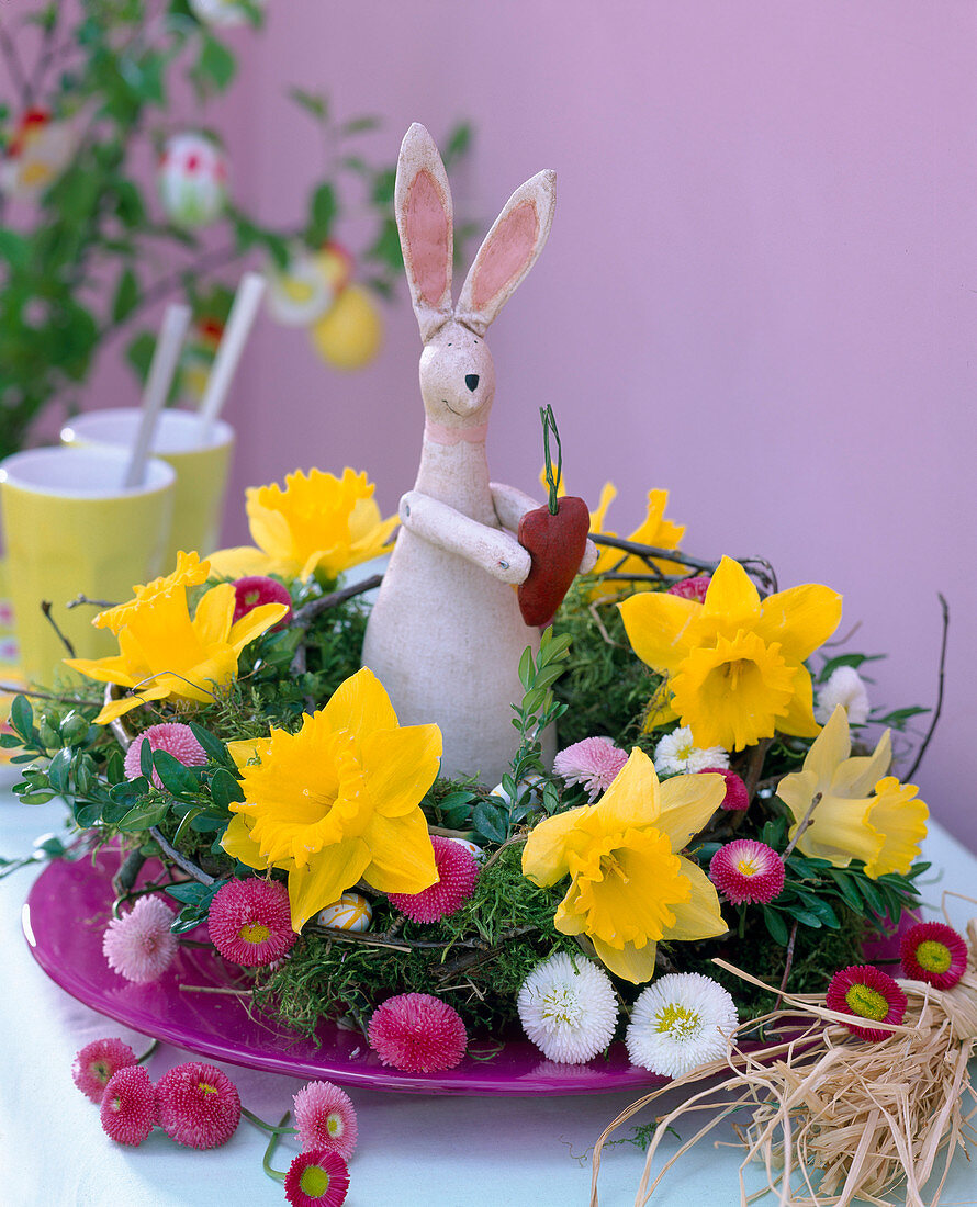 Moss wreath with Narcissus (Daffodil), Bellis (daisies)