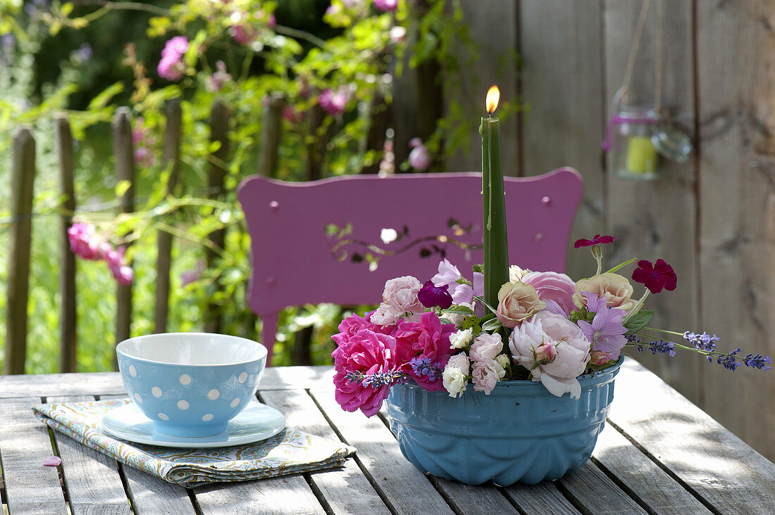 Arrangement of flowers of Rosa (Rose), Lavandula (Lavender), Malva