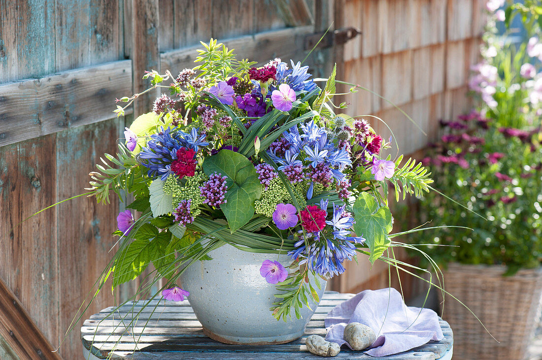 Colorful bouquet of Agapanthus (lily), geranium