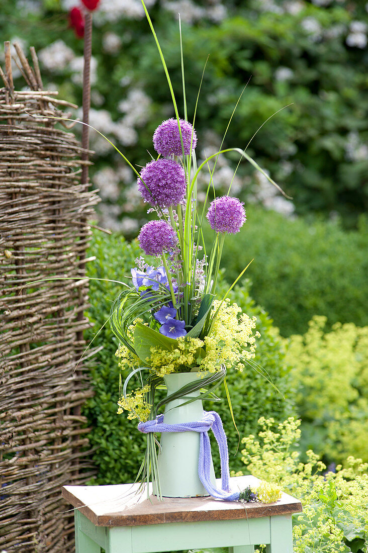 Modern bouquet of Allium 'Globemaster', Alchemilla mollis