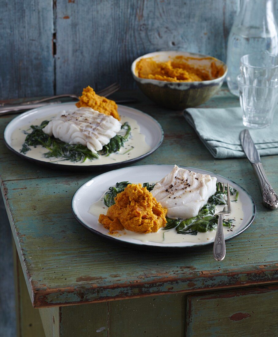 Cod with carrot hummus and baby leaf spinach