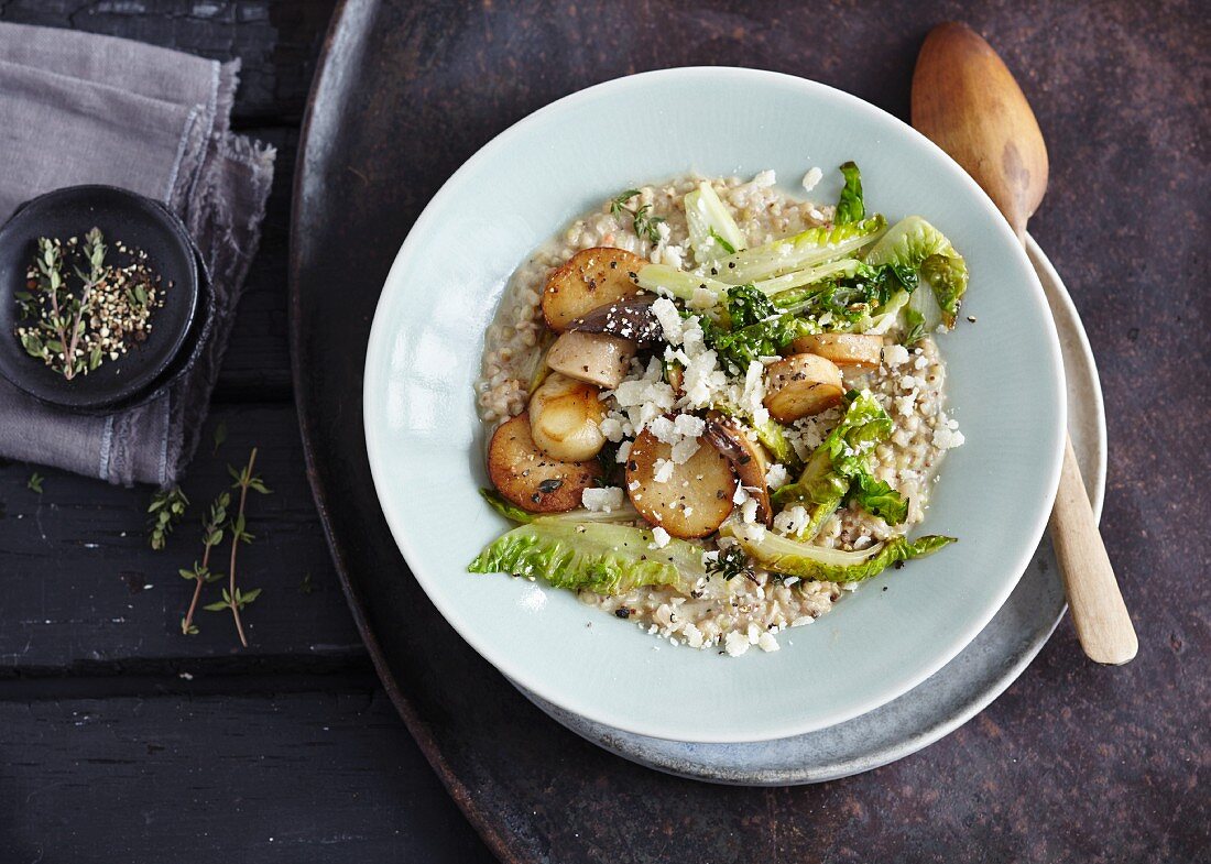Vegetarian buckwheat risotto with king trumpet mushrooms and romaine lettuce