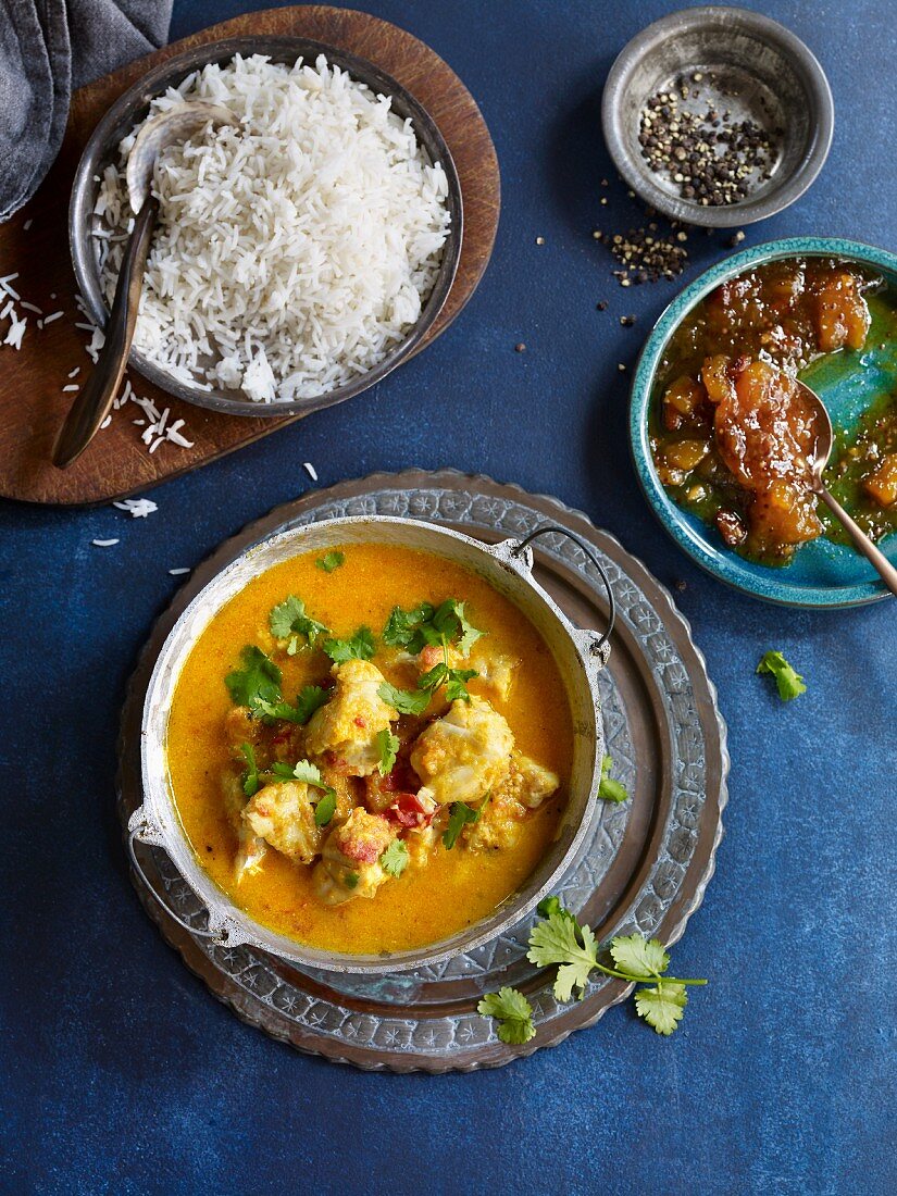 Fish curry with mango, tomatoes and coconut milk (Asia)