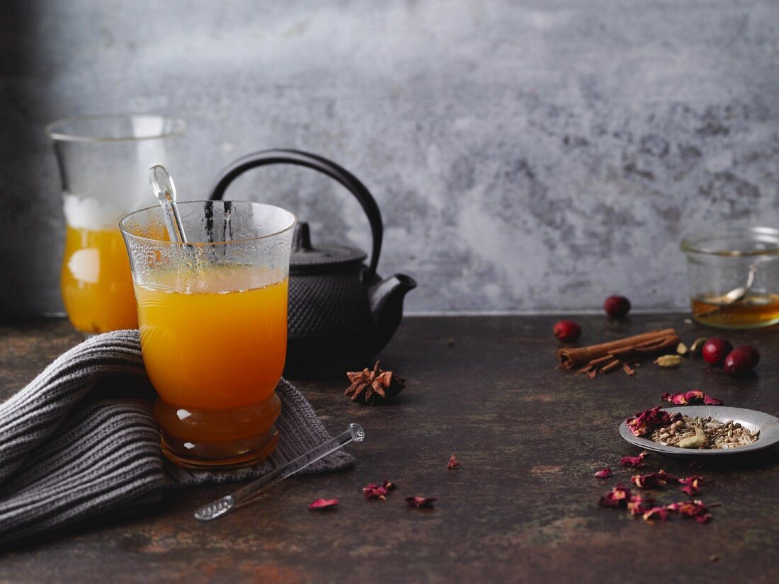 Hot orange and ginger tea with spices