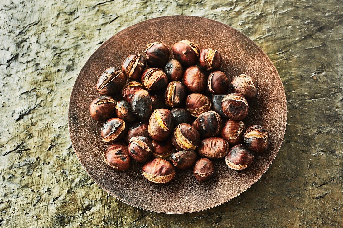 Roasted chestnuts in a bowl