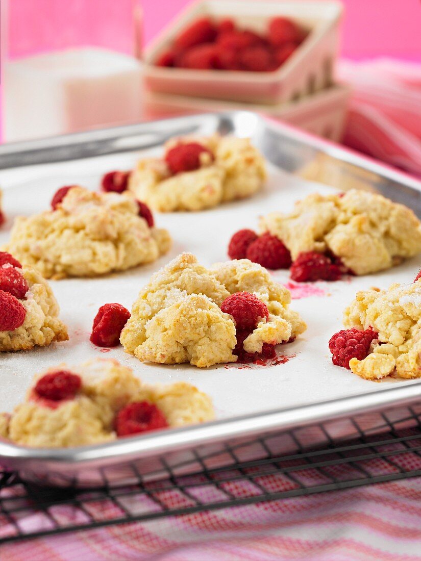 Raspberry drop scones on a baking tray